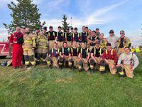 Lakeland College firefighter training students and staff pose in this undated handout photo. THE CANADIAN PRESS/HO, Lakeland College *MANDATORY CREDIT*