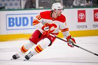 Nov 24, 2023; Dallas, Texas, USA; Calgary Flames center Blake Coleman (20) skates against the Dallas Stars during the third period at the American Airlines Center. Mandatory Credit: Jerome Miron-USA TODAY Sports
