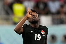 Canada's Alphonso Davies celebrates after scoring the opening goal during the World Cup group F soccer match between Croatia and Canada, at the Khalifa International Stadium in Doha, Qatar, Sunday, Nov. 27, 2022. (AP Photo/Martin Meissner)