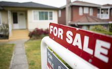 A real estate sign is pictured in Vancouver on June, 12, 2018. Home sales in Metro Vancouver in March plunged to levels not seen in more than three decades and real estate experts blame government policies, not a lack of demand for the dismal showing. THE CANADIAN PRESS Jonathan Hayward