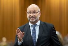 Minister of Justice and Attorney General of Canada David Lametti rises during Question Period, Thursday, February 16, 2023 in Ottawa.  THE CANADIAN PRESS/Adrian Wyld