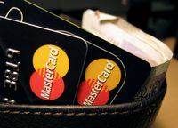 FILE PHOTO: MasterCard credit cards are seen in this photo illustration, December 8, 2010. REUTERS/Jonathan Bainbridge/Illustration/File Photo