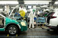 An autoworker stands on the production line for the Honda CRV, at a Honda plant in Alliston, Ont., on Wednesday, March 16, 2022. THE CANADIAN PRESS/Chris Young