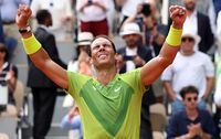 Spain's Rafael Nadal celebrates after victory over Norway's Casper Ruud in their men's singles final match on day fifteen of the Roland-Garros Open tennis tournament at the Court Philippe-Chatrier in Paris on June 5, 2022. (Photo by Thomas SAMSON / AFP) (Photo by THOMAS SAMSON/AFP via Getty Images)