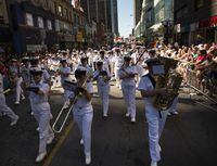 Members of the Royal Canadian Navy take part in the 2019 Pride Parade in Toronto, on June 23, 2019.