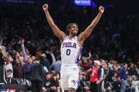 Apr 20, 2023; Brooklyn, New York, USA; Philadelphia 76ers guard Tyrese Maxey (0) celebrates during game three of the 2023 NBA playoffs against the Brooklyn Nets at Barclays Center. Mandatory Credit: Wendell Cruz-USA TODAY Sports