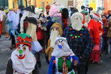 The annual Mummer's Parade in Downtown St. John's, NL. Participants in traditional mummer costumes.
