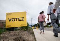 People arriving at a polling station in Vaughan, Ont., which is Liberal leader Steven Del Duca’s electoral riding, are photographed on June 2, 2022. Fred Lum/The Globe and Mail. 