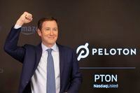 FILE - Peloton CEO John Foley celebrates at the Nasdaq MarketSite before the opening bell and his company's IPO, Sept. 26, 2019 in New York. The co-founder of Peloton is stepping down after an extended streak of tumult at the exercise and treadmill company. John Foley will no longer serve as Peloton's CEO as of Wednesday, Feb. 8, 2022. Barry McCarthy will take over the role and will also serve as president and a board member.  (AP Photo/Mark Lennihan, file)