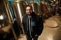 Andrew Sookram, pictured here in his Winnipeg brewery, turned his home-brewing hobby into a career.