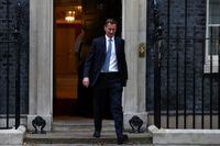 New Chancellor of the Exchequer Jeremy Hunt leaves 10 Downing Street in London on Oct. 14.