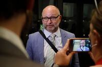 Justice Minister and Attorney General David Lametti speaks with reporters as he arrives for a caucus meeting on Parliament Hill in Ottawa on Wednesday, June 22, 2022. THE CANADIAN PRESS/ Patrick Doyle