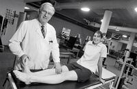 SPORTS MEDICINE -- The Fowler Kennedy Sport Clinic at University of Western Ontario in London, Ontario.  Dr. Peter Fowler looks at leg of Ainsley Tomczyk, 15, June 11, 1997. She has a skating injury.  Photo by Edward Regan / The Globe and Mail