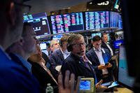 Traders work on the floor of the New York Stock Exchange (NYSE) in New York City, U.S., July 21, 2022.  REUTERS/Brendan McDermid
