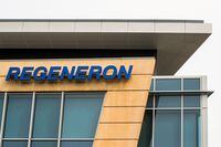 FILE PHOTO: The Regeneron Pharmaceuticals company logo is seen on a building at the company's Westchester campus in Tarrytown, New York, U.S. September 17, 2020. REUTERS/Brendan McDermid/File Photo