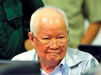In this photo released by the Extraordinary Chambers in the Courts of Cambodia, Khieu Samphan, former Khmer Rouge head of state, sits in a court room before a hearing at the U.N.-backed war crimes tribunal in Phnom Penh, Cambodia, Friday, Nov. 16, 2018. The international tribunal to judge the criminal responsibility of former Khmer Rouge leaders for the deaths of an estimated 1.7 million Cambodians opened its session Friday to deliver its verdicts on charges of genocide and other crimes. (Mark Peters/Extraordinary Chambers in the Courts of Cambodia via AP)