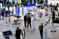 People visit the Edge display during the Dubai Airshow in Dubai, United Arab Emirates, November 15, 2021. REUTERS/Stringer