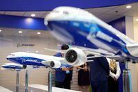 FILE PHOTO: A model of Boeing 777 airliner is seen displayed at the China International Aviation and Aerospace Exhibition, or Airshow China, in Zhuhai, Guangdong province, China September 28, 2021. REUTERS/Aly Song