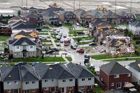 An aerial view shows damage to buildings in a suburb in the aftermath of a tornado in Barrie, Ontario, Canada July 15, 2021, in this still image obtained from video. Courtesy of Edward Loveless / Social Media via REUTERS  ATTENTION EDITORS - THIS IMAGE HAS BEEN SUPPLIED BY A THIRD PARTY. MANDATORY CREDIT EDWARD LOVELESS.