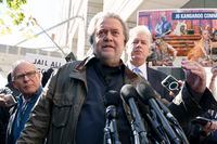 Steve Bannon, center, a longtime ally of former President Donald Trump and convicted of contempt of Congress,  accompanied by his attorneys David Schoen, left, and Evan Corcoran, right, speaks to the media as he leaves the federal courthouse on Friday, Oct. 21, 2022, in Washington. Bannon was sentenced to 4 months behind bars for defying a Jan. 6 committee subpoena. ( AP Photo/Jose Luis Magana)
