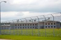 FILE - The perimeter of the Diboll Correctional Facility is seen on July 19, 2014, in Diboll, Texas. A new report on Thursday, July 14, 2022, says many Texas prison inmates fear dying or falling gravely ill from the hot weather and believe actions taken by officials to mitigate the dangerous conditions continue to fall short. (Rhonda Oaks/The Daily News via AP, File)