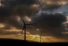 LANCASTER, ENGLAND - NOVEMBER 25: Wind turbines adorn the landscape on Caton Moor, near Lancaster  on November 25, 2022 in Lancaster, England. Two former Conservative prime ministers - Boris Johnson and Liz Truss - have joined the group of MPs calling for England's restrictions on onshore wind farm construction to be overturned. A de fact moratorium was imposed on new wind farms in 2015 by the government of David Cameron, under pressure from Conservative MPs and councils who found them unsightly. Some were allowed to proceed following a rules change in 2020, but planning rules continue to hamper new projects. (Photo by Christopher Furlong/Getty Images)