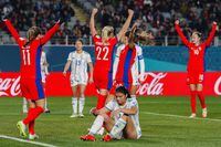 Norway players celebrate after Philippines' Alicia Barker, bottom, scored an own goal during the Women's World Cup Group A soccer match between Norway and Philippines at Eden Park stadium in Auckland, New Zealand, Sunday, July 30.