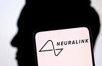 FILE PHOTO: Neuralink logo and Elon Musk silhouette are seen in this illustration taken, December 19, 2022. REUTERS/Dado Ruvic/Illustration/File Photo