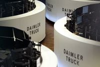 The logo of the German automotive producer Daimler Truck is pictured at the stock exchange in Frankfurt, Germany, on December 10, 2021. (Photo by Daniel ROLAND / AFP) (Photo by DANIEL ROLAND/AFP via Getty Images)