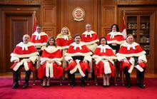 Justice Michelle O'Bonsawin, top right, takes part in a group photo with Judges Mahmud Jamal, back row left to right, Sheilah L. Martin, Nicholas Kasirer, and Russell Brown, bottom row left to right, Andromache Karakatsanis, Richard Wagner, Suzanne Cote, and Malcolm Rowe prior to her welcoming ceremony at the Supreme Court of Canada in Ottawa, on Monday, Nov. 28, 2022. O'Bonsawin is the first Indigenous judge to be appointed to the Supreme Court of Canada. THE CANADIAN PRESS/Sean Kilpatrick
