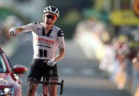 Denmark's Soren Kragh Andersen celebrates as he crosses the line to win the 19th stage of the Tour de France cycling race over 166.5 kilometers between Bourg-En-Bresse and Champagole, France Friday, Sept. 3, 2020. (Benoit Tessier/Pool via AP)