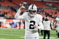 Las Vegas Raiders kicker Daniel Carlson (2) runs off the field after his team defeated the Cleveland Browns in an NFL football game, Monday, Dec. 20, 2021, in Cleveland. (AP Photo/Ron Schwane)