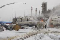 In this photo released by Telegram Channel of head of the Kingisepp district administration Yuri Zapalatskiy, fire fighters extinguish the blaze at Russia's second-largest natural gas producer, Novatek in Ust-Luga, 165 kilometers southwest of St. Petersburg, Russia, Sunday, Jan. 21, 2024. Fire broke out at a chemical transport terminal at Russia's Ust-Luga port Sunday following two explosions, regional officials reported. Local media reported that the port had been attacked by Ukrainian drones, causing a gas tank to explode. (Telegram Channel of head of the Kingisepp district administration Yuri Zapalatskiy via AP)