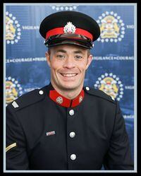 Sgt. Andrew Harnett, 37, of the Calgary Police Service is shown in this undated handout image provided by the police service. THE CANADIAN PRESS/HO-Calgary Police Service *MANDATORY CREDIT*
