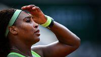 Serena Williams of the US reacts as she plays against Kazakhstan's Elena Rybakina during their women's singles fourth round tennis match on Day 8 of The Roland Garros 2021 French Open tennis tournament in Paris on June 6, 2021. (Photo by Christophe ARCHAMBAULT / AFP) (Photo by CHRISTOPHE ARCHAMBAULT/AFP via Getty Images)