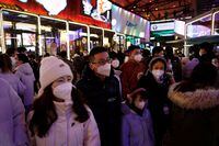 Visitors throng a shopping complex on New Year's Eve, amid the coronavirus disease (COVID-19) outbreak in Beijing, China December 31, 2022. REUTERS/Florence Lo