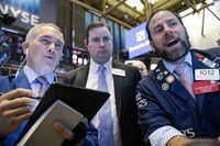 Traders work on the floor of the New York Stock Exchange (NYSE) in New York, U.S., February 19, 2020. REUTERS/Brendan McDermid