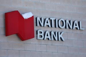 FILE PHOTO: FILE PHOTO: The National Bank of Canada logo is seen outside of a branch in Ottawa, Ontario, Canada, February 14, 2019. REUTERS/Chris Wattie/File Photo/File Photo