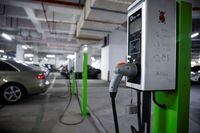 A electric car charging station is pictured in a parking lot in Shanghai, China March 13, 2021. Picture taken March 13, 2021. REUTERS/Aly Song