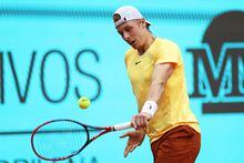 MADRID, SPAIN - APRIL 29: Denis Shapovalov of Canada plays a backhand against Zhang Zhizhen of China during the Men's Round of 64 match on Day Six of the Mutua Madrid Open at La Caja Magica on April 29, 2023 in Madrid, Spain. (Photo by Clive Brunskill/Getty Images)