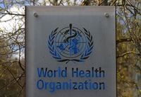 FILE PHOTO: A logo is pictured outside a building of the World Health Organization (WHO) during an executive board meeting on update on the coronavirus disease (COVID-19) outbreak, in Geneva, Switzerland, April 6, 2021. REUTERS/Denis Balibouse/File Photo