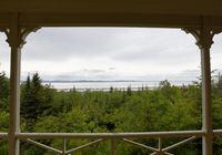 A few of the St. Lawrence River and the mountains on Quebec's North Shore are seen from the verandah of the summer home in St Patrick, Quebec where Sir John A. MacDonald, Canada's first prime minister, summered between 1873 and 1890. (Fred Lum/The Globe and Mail)