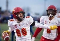University of Calgary Dinos' Hunter Karl celebrates his touchdown during second half U Sports Vanier Cup university football action against the University of Montreal Carabins, in Quebec City, Sunday, Nov. 23, 2019.