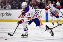 Apr 5, 2023; Anaheim, California, USA; Edmonton Oilers center Leon Draisaitl (29) moves the puck against the Anaheim Ducks during the first period at Honda Center. Mandatory Credit: Gary A. Vasquez-USA TODAY Sports