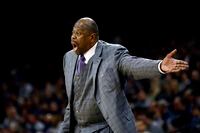 FILE - In this Saturday, Jan. 11, 2020, file photo, Georgetown head coach Patrick Ewing yells to his team during the first half of an NCAA college basketball game against Villanova, in Philadelphia.