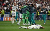 Soccer Football - Champions League Final - Liverpool v Real Madrid - Stade de France, Saint-Denis near Paris, France - May 28, 2022 Real Madrid's Luka Modric celebrates after winning the Champions League REUTERS/Dylan Martinez