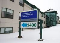 The former Herron seniors residence, which was one of the hardest hit during the first wave of the pandemic, is seen Monday, February 15, 2021 in Montreal. Hearings for the Quebec coroner's public inquiry begin Monday into deaths that occurred in nursing homes and other seniors' residences during the first wave of the COVID-19 pandemic.THE CANADIAN PRESS/Ryan Remiorz