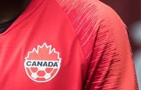 A Canada soccer logo is seen on Alphonso Davies in Vancouver on March 24, 2019. Canada defeated Barbados 4-1 in a soccer friendly on Friday.