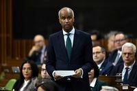 Minister of International Development Ahmed Hussen rises during Question Period in the House of Commons on Parliament Hill in Ottawa on Thursday, Oct. 19, 2023. THE CANADIAN PRESS/Justin Tang