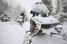 The Taiga performance team takes their Nomad Utility Snowmobile, 100% electric, out on the trail in Saint-Faustin-Lac-Carre, Quebec March 2, 2023. (Christinne Muschi /The Globe and Mail)